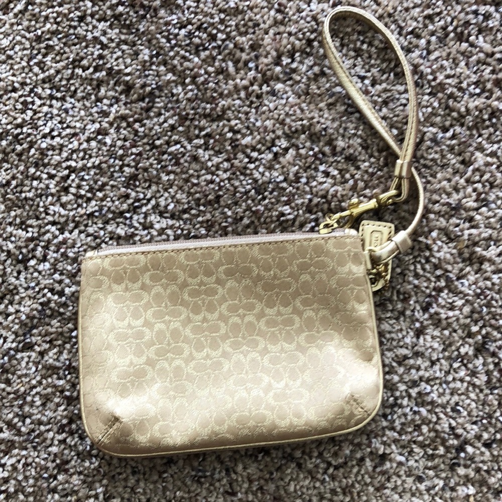 Gold coach wristlet
